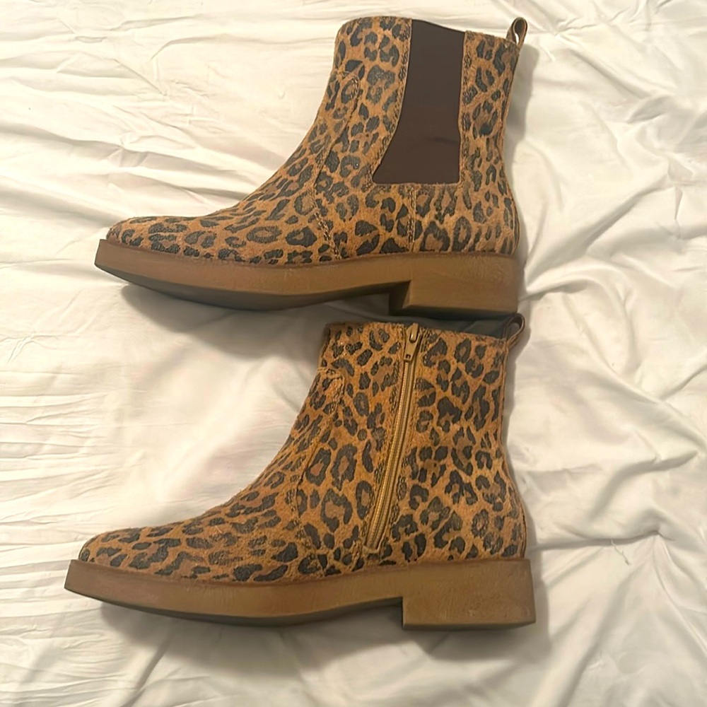 Cheetah print boots, super cute, nothing wrong with them.
